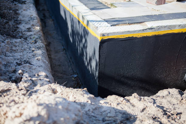 Professional Waterproofing technician working in Florence, IN
